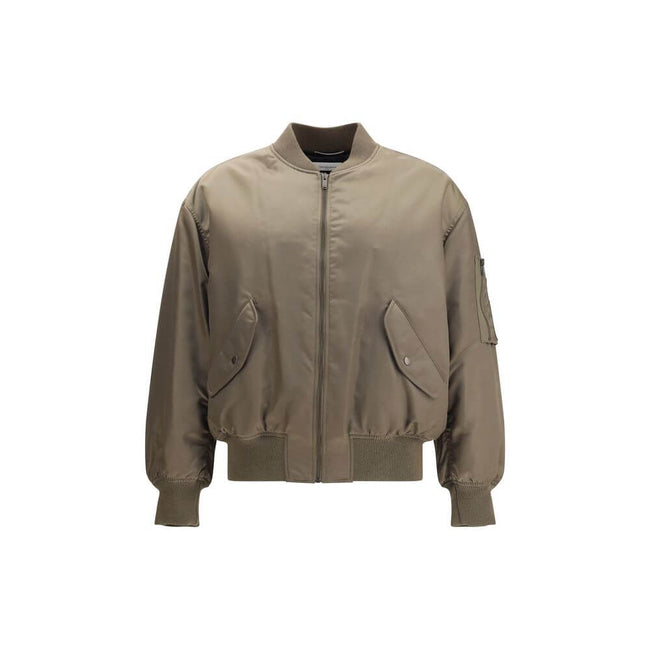 Bicolor Polyamide BomberSaint Laurent’s oversized bomber Jacket is made of water-repellent recycled polyamide, perfect for an urban and functional look. Featuring a front zipper closure, it has two slanted flap and snap pockets, a zippered sleeve pocket a