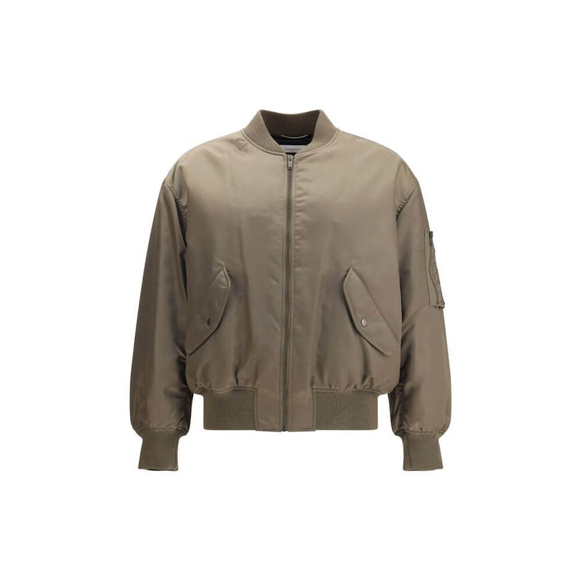 Bicolor Polyamide BomberSaint Laurent’s oversized bomber Jacket is made of water-repellent recycled polyamide, perfect for an urban and functional look. Featuring a front zipper closure, it has two slanted flap and snap pockets, a zippered sleeve pocket a