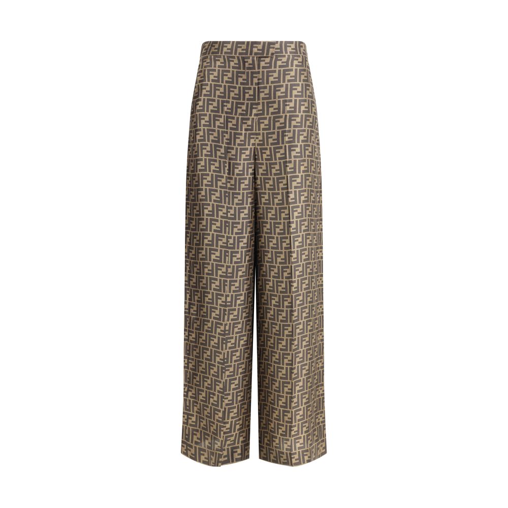 Brown Silk Casual PantsFendi’s monogram pattern silk Pants are an elegant garment with timeless appeal. Made of fine silk, they feature a palazzo cut with a high waist that slims the figure. The classic FF monogram characterizes the entire surface, giving