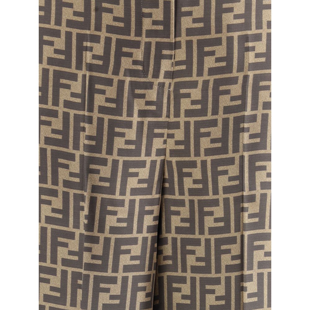 Brown Silk Casual PantsFendi’s monogram pattern silk Pants are an elegant garment with timeless appeal. Made of fine silk, they feature a palazzo cut with a high waist that slims the figure. The classic FF monogram characterizes the entire surface, giving