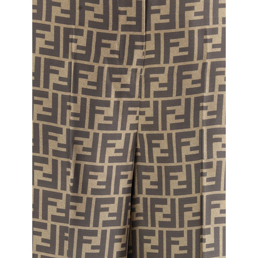 Brown Silk Casual PantsFendi’s monogram pattern silk Pants are an elegant garment with timeless appeal. Made of fine silk, they feature a palazzo cut with a high waist that slims the figure. The classic FF monogram characterizes the entire surface, giving