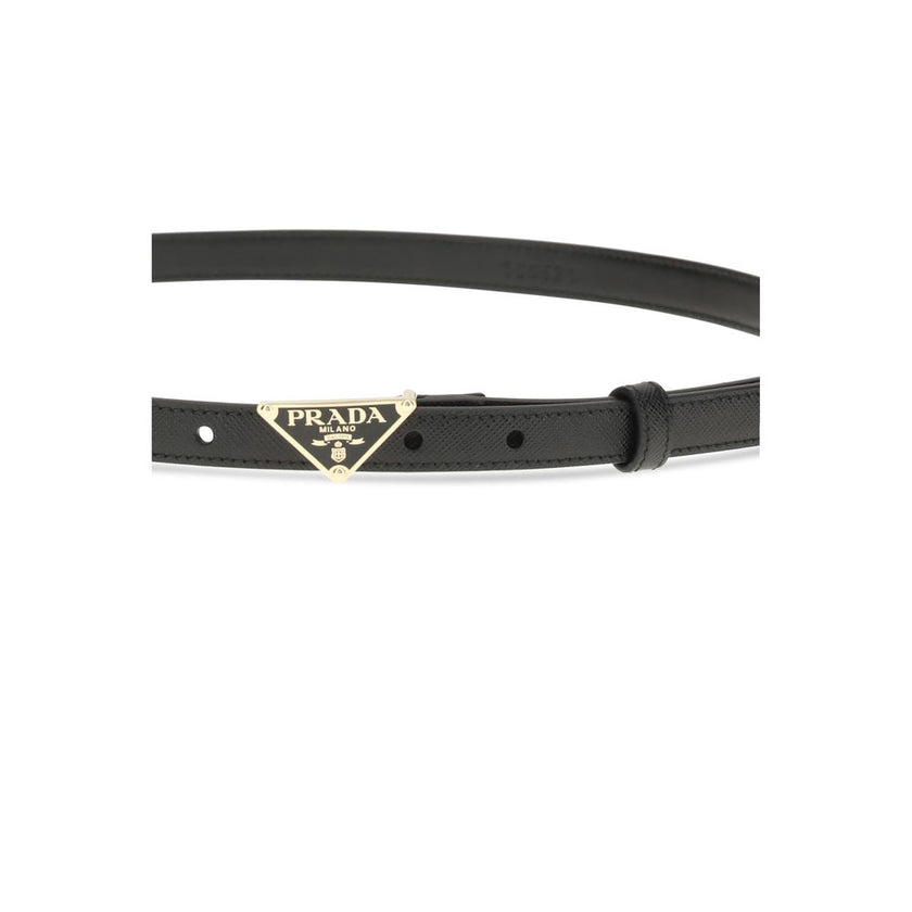 Saffiano BeltPrada’s Saffiano Belt is an accessory with an essential and refined design that reflects the brand’s timeless elegance. Made of the iconic Saffiano leather, recognizable by its textured scratched effect and waxed finish, it is complemented by