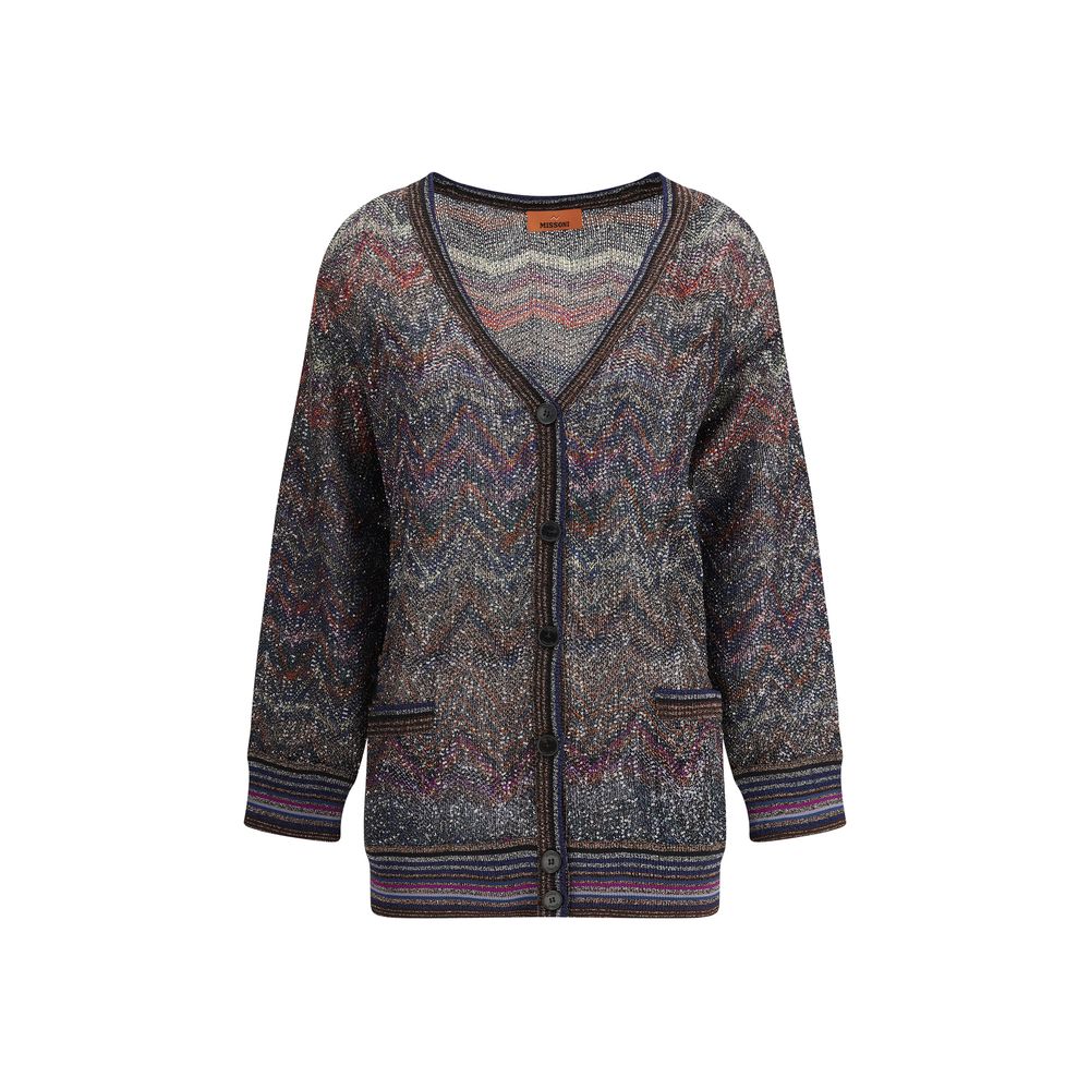Caperdoni Buttoned CardiganMissoni’s zig zag-patterned oversized cardigan is a wrap-around, coveted piece made with Caperdoni’s exclusive loom work. Featuring a V-neckline, button closure and practical front pockets, it is embellished with the Maison’s ic