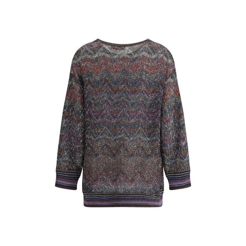 Caperdoni Buttoned CardiganMissoni’s zig zag-patterned oversized cardigan is a wrap-around, coveted piece made with Caperdoni’s exclusive loom work. Featuring a V-neckline, button closure and practical front pockets, it is embellished with the Maison’s ic