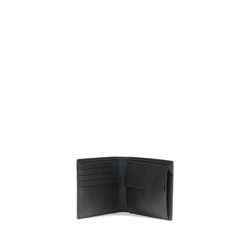 Black Calf Leather Bos Taurus WalletSaint Laurent’s black leather wallet is a stylish and functional accessory with a bill fold design. Made of high-quality smooth leather, it features interior card slots, a snap-button coin compartment and several bill c