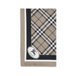 Beige Silk ScarfBurberry’s silk Scarf celebrates the house’s heritage with timeless elegance. Featuring the iconic all-over Archive Check pattern, it is embellished with the Equestrian Knight logo printed on one of the corners. Made of fine silk, it is th