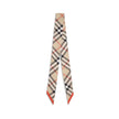 Beige Silk ScarfBurberry’s silk Check Scarf is a timeless classic, made of pure silk and decorated with the unmistakable Burberry Check print. Elegant and versatile, it adds an iconic touch to any look, confirming the distinctive style of the British fash
