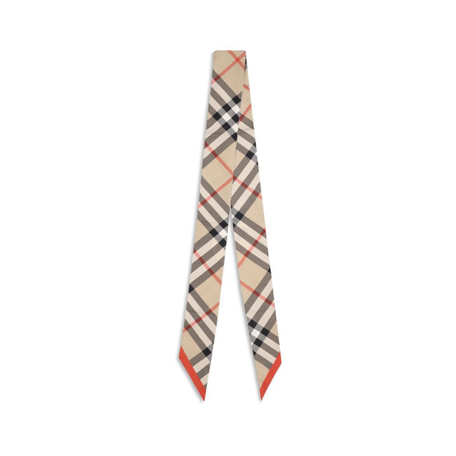 Beige Silk ScarfBurberry’s silk Check Scarf is a timeless classic, made of pure silk and decorated with the unmistakable Burberry Check print. Elegant and versatile, it adds an iconic touch to any look, confirming the distinctive style of the British fash