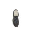 White Leather Low Top SneakersGucci’s G75 Sneakers reinterpret the retro sports aesthetic with premium materials and iconic details. Made of gray suede with GG nylon inserts, they feature a low-slung silhouette and a classic lace-up closure. The leather l