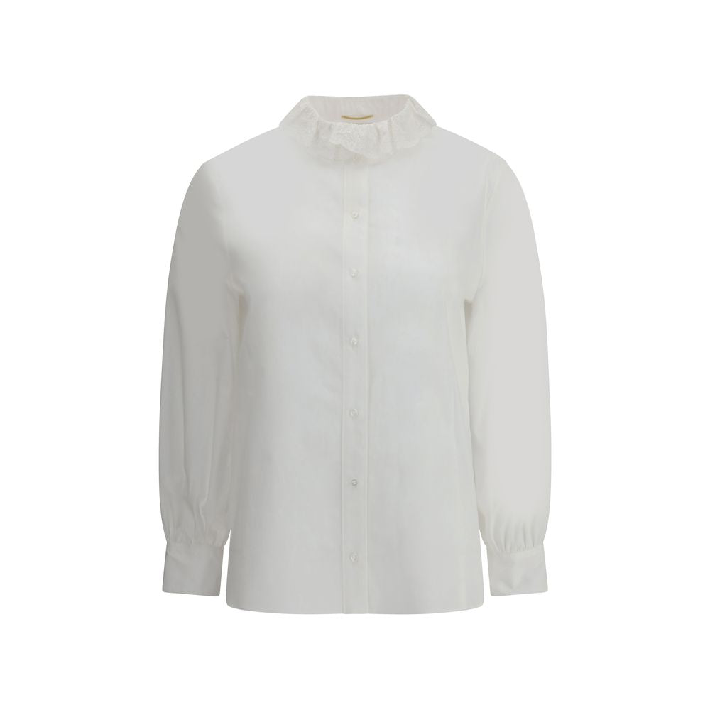 White Cotton Dress ShirtSaint Laurent’s cotton poplin Shirt combines sartorial rigor and romantic details in a sophisticated balance. Featuring a front button closure, it features a delicate Pierrot collar trimmed with lace that adds a feminine, retro tou