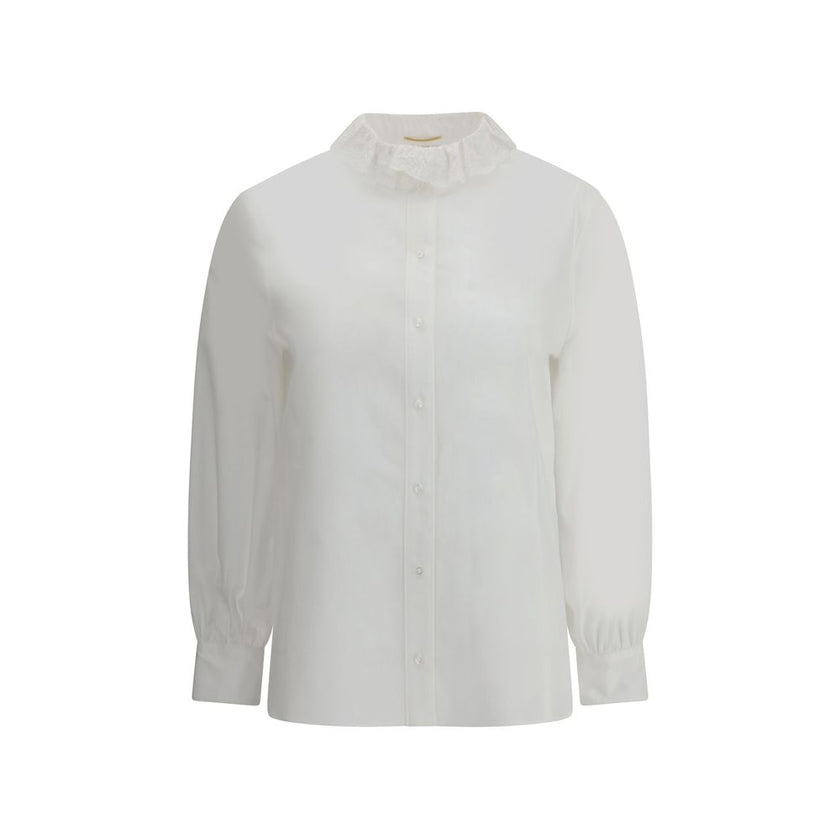 White Cotton Dress ShirtSaint Laurent’s cotton poplin Shirt combines sartorial rigor and romantic details in a sophisticated balance. Featuring a front button closure, it features a delicate Pierrot collar trimmed with lace that adds a feminine, retro tou