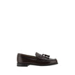 Brown Calf Leather Bos Taurus Slip-On LoafersCalfskin Loafers by Prada, slightly elongated round toe, leather block heel, front tray embellished with leather tassel, press-stamped logo insole, patent leather design. Season: AW25 Composition: 100% Calf Lea