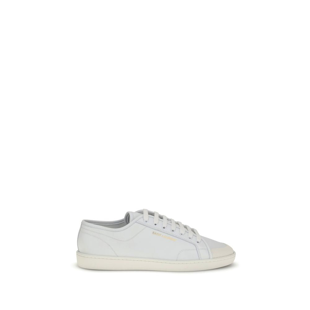 White Calf Leather Bos Taurus Low Top SneakersSaint Laurent’s Gym Sneakers are a contemporary classic, featuring a lace-up closure and a gold SAINT LAURENT signature on the side that adds a touch of understated luxury. The flat rubber sole ensures comfort
