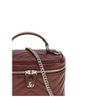 Bordeaux Calf Leather Bos Taurus Shoulder BagGucci’s Vanity mini Shoulder Bag is a compact and sophisticated accessory made of black matelassé leather with the iconic chevron pattern. Light gold hardware enhances the design, while the black taffeta lining