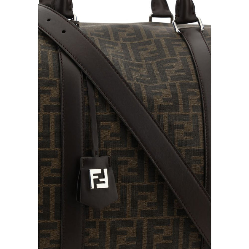 Brown Canvas Luggage And TravelBoston Travel Bag by Fendi, two leather top handles, jacquard design with iconic FF monogram repeated all-over, top closure by double-slider zipper, adjustable and removable leather shoulder strap by snap hooks., large singl