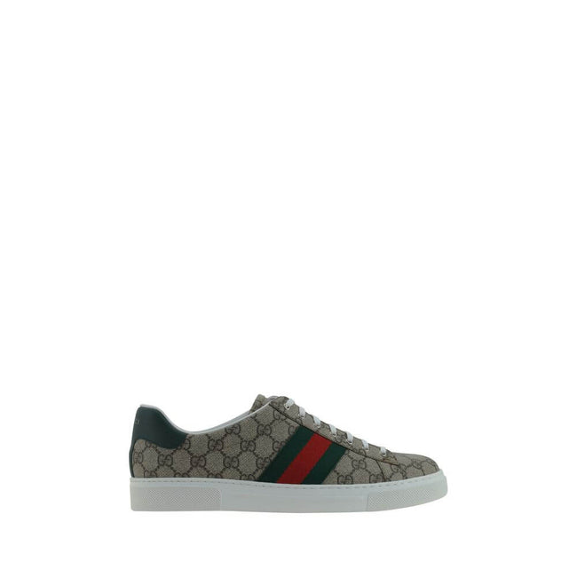 Beige Rubber Low Top SneakersSneakers by Gucci, lace-up front closure, round toe, contrasting platform sole, leather back logo detail, oblique bands on side panels, all-over repeated iconic GG jacquard fabric, iconic brand monogram pressure-stamped on fro