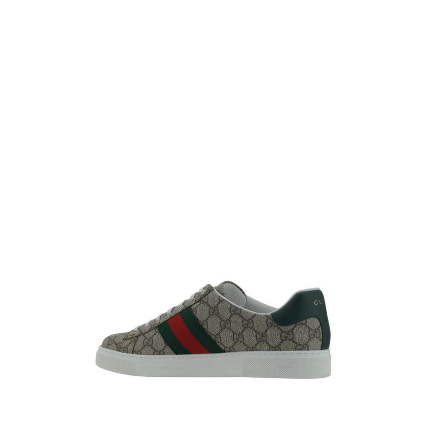 Beige Rubber Low Top SneakersSneakers by Gucci, lace-up front closure, round toe, contrasting platform sole, leather back logo detail, oblique bands on side panels, all-over repeated iconic GG jacquard fabric, iconic brand monogram pressure-stamped on fro