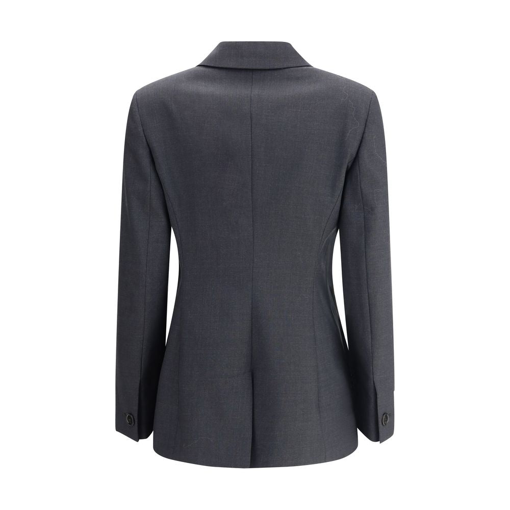 Gray Wool ClothingGucci’s wool Blazer is a classic piece with a bold style, enhanced by distinctive tailoring details. The double-breasted button closure lends structure and sophistication, while the two front welt flap pockets add functionality and symme