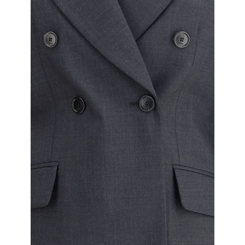 Gray Wool ClothingGucci’s wool Blazer is a classic piece with a bold style, enhanced by distinctive tailoring details. The double-breasted button closure lends structure and sophistication, while the two front welt flap pockets add functionality and symme