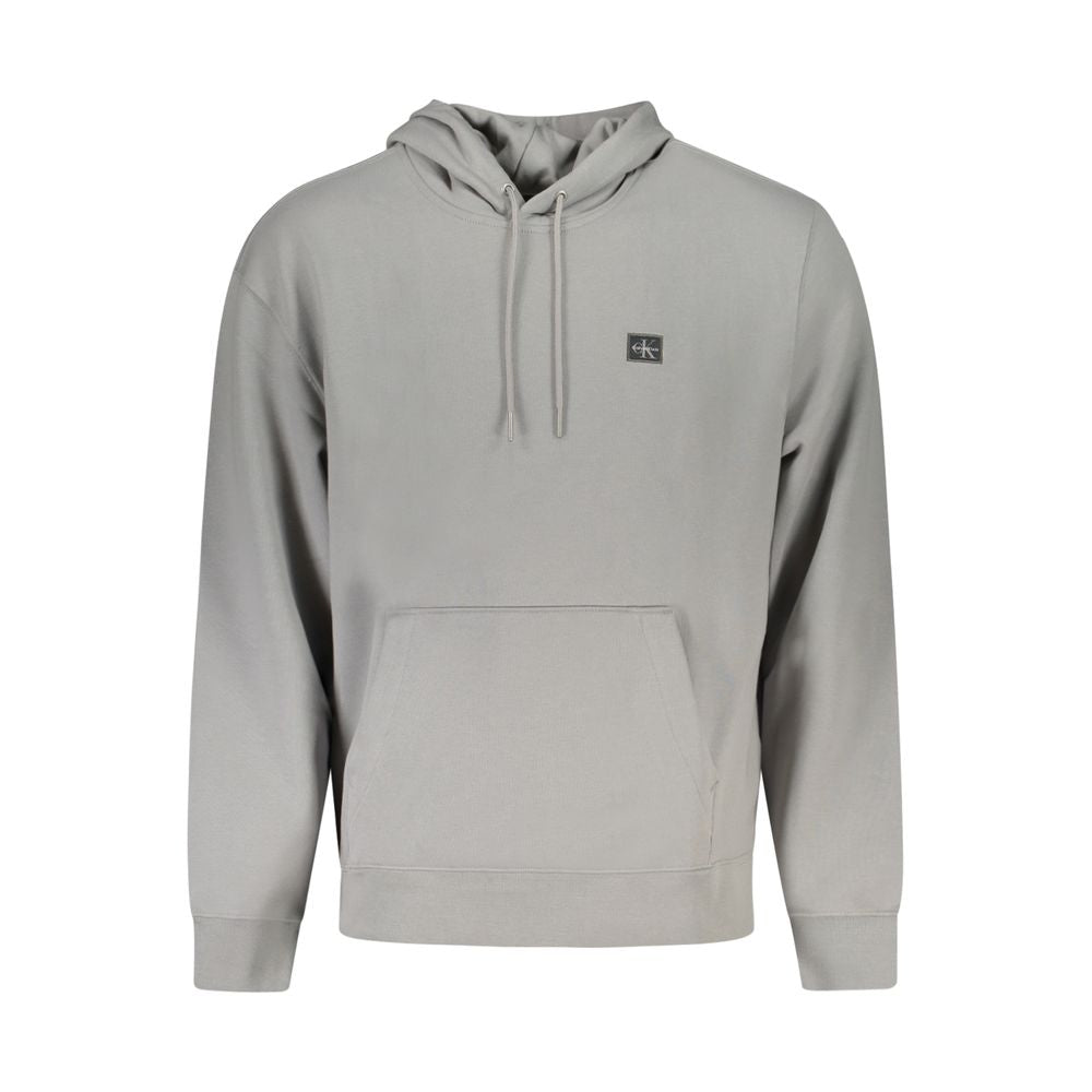 Gray Recycled Polyester Men SweaterElevate your casual wardrobe with the unmistakable style of Calvin Klein. This sleek, long-sleeved hooded sweatshirt, crafted from a cozy blend of cotton and recycled polyester, balances comfort with eco-conscious fashio