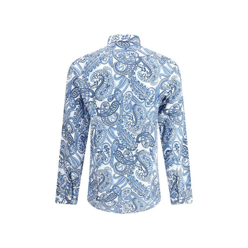 Light Blue Cotton Pattern ShirtEtro’s paisley print Shirt embodies the Maison’s distinctive elegance, reinterpreting the iconic motif in a contemporary key. Made with a regular fit, it is completed with a French collar, double-button cuffs and front butto