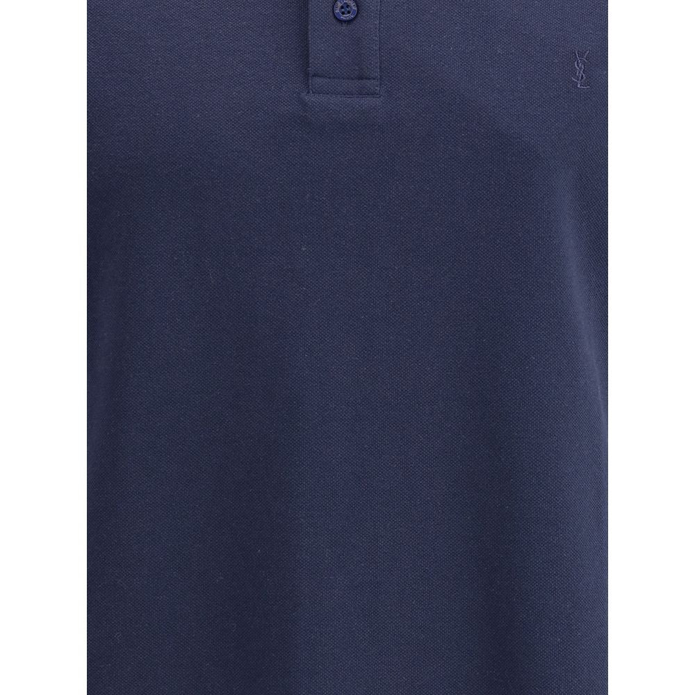Blue Cotton Polo ShirtThe Cassandre cotton polo Shirt by Saint Laurent is an essential garment with understated elegance. Featuring a classic ribbed collar and tone-on-tone buttons on the front, it features the iconic Cassandre logo embroidered also tone-