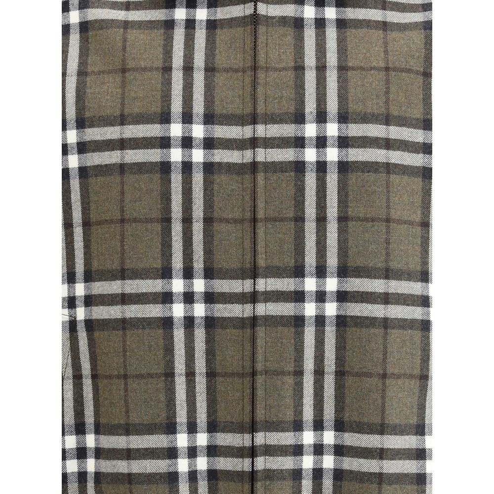 Green Wool BomberBurberry’s check pattern wool Harrington Jacket is a sophisticated interpretation of a timeless classic. Made of wool with the house’s unmistakable check pattern, it features a double-slider zipper closure, side welt pockets with snap but