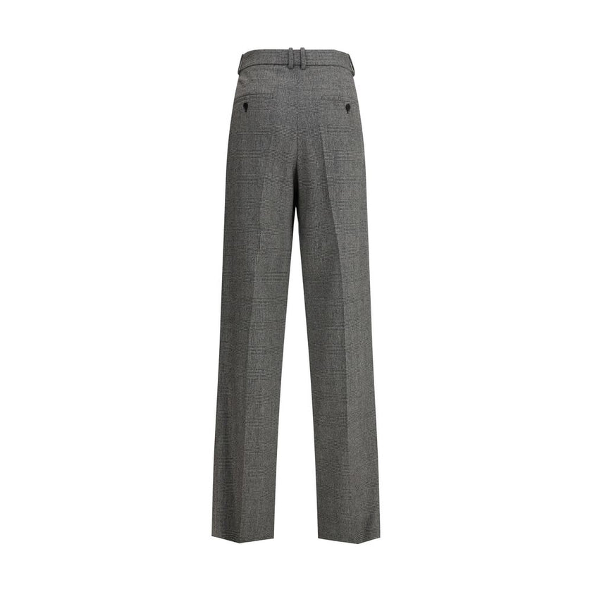 Prince de Galles tailored PantsSaint Laurent’s Prince de Galles tailored Pants reinterpret a classic English tradition with the house’s essential elegance. They feature a front zip-and-hook closure, belt loops at the waist, and a straight-leg silhouette p