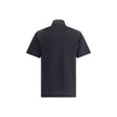 Black Cotton Polo ShirtFendi’s cotton polo Shirt is a distinctive garment that combines elegance and brand identity. Made of soft cotton, it features a classic ribbed collar and tone-on-tone buttons on the front. The all-over repeated FF jacquard print gi
