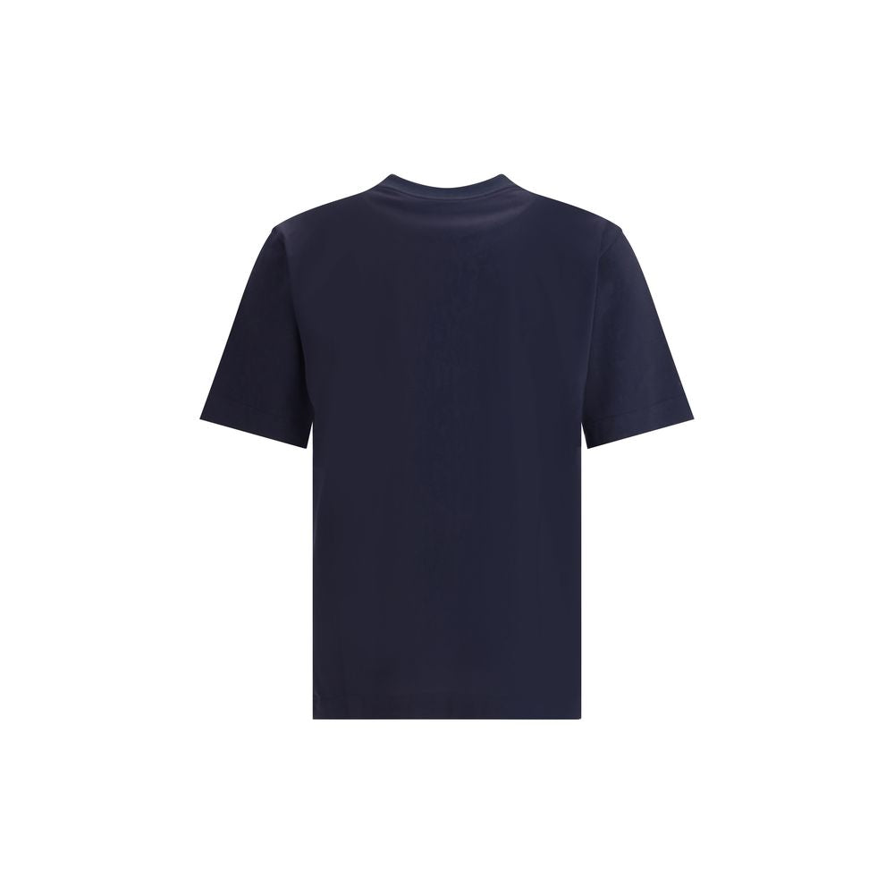 Blue Cotton T-ShirtFendi’s logo T-Shirt is an essential garment with a strong character. Made of soft cotton, it features a ribbed crew neck and a contrasting Fendi print on the front, giving the design a distinctive and iconic touch. Perfect for a casual