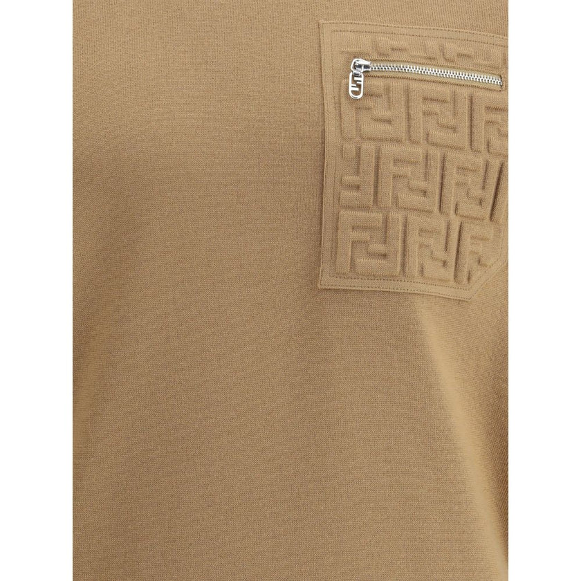 Beige Fleece Wool SweatshirtVirgin wool Sweater by Fendi features a ribbed crew neck, cuffs and hem for a comfortable and defined fit. The zippered slit pocket adds a practical and modern touch, while the iconic embossed FF logo gives the garment a distin
