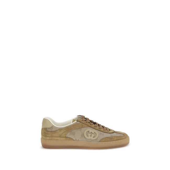 Beige Leather Athletic SneakersGucci’s G75 Sneakers reinterpret the retro sports aesthetic with premium materials and iconic details. Made of gray suede with GG nylon inserts, they feature a low-slung silhouette and a classic lace-up closure. The leather