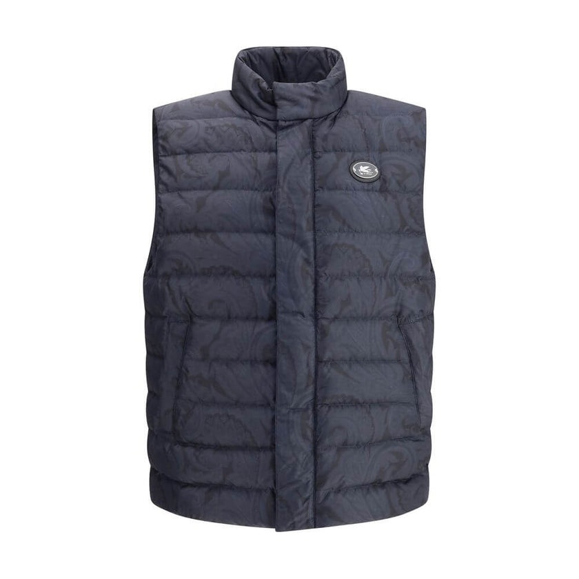 Blue Polyester Sleveless JacketEtro’s Down Vest is a refined-inspired garment enhanced by a tone-on-tone floral print that enhances its elegance. Featuring a high collar and concealed front button closure, it has practical side pockets and an adjustable d