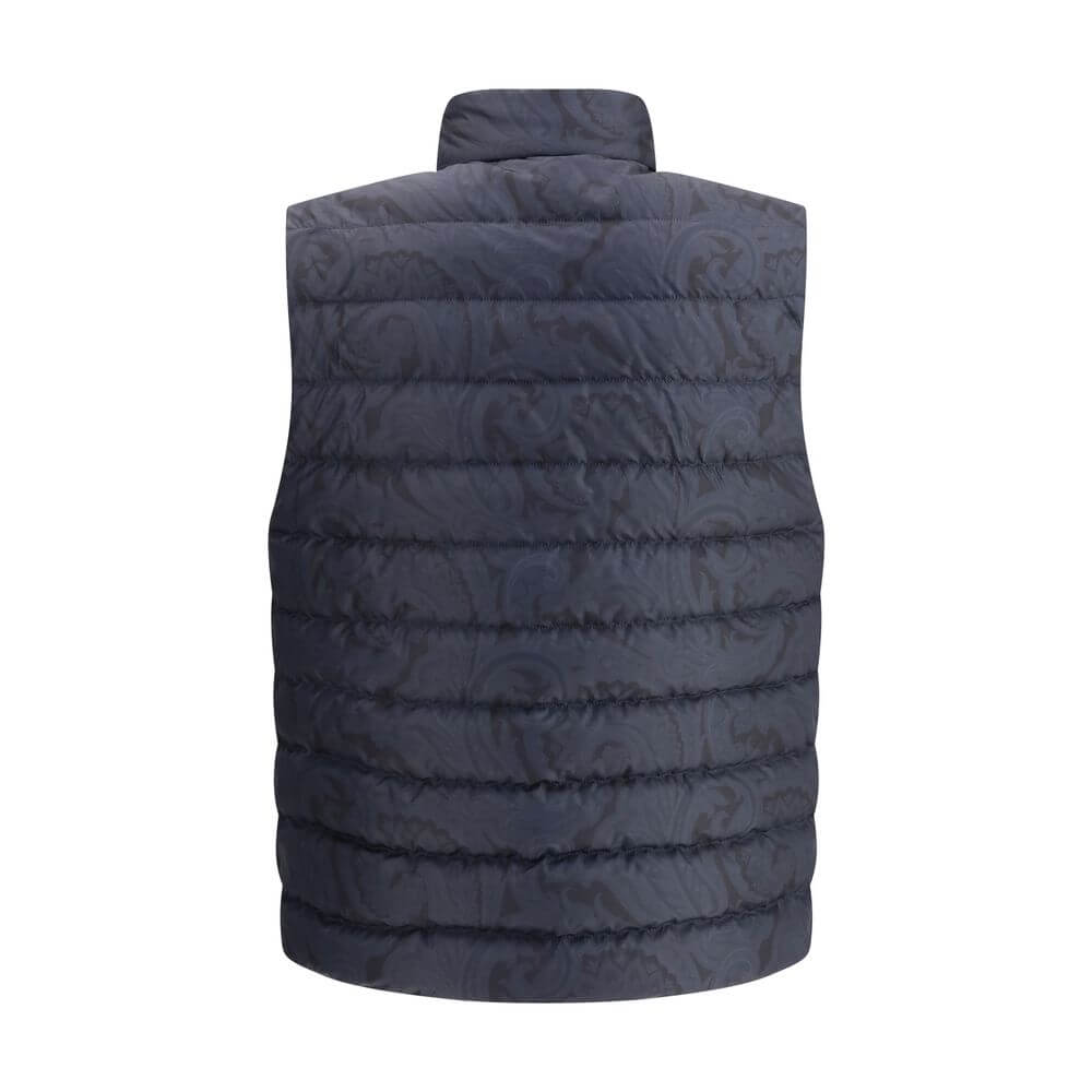 Blue Polyester Sleveless JacketEtro’s Down Vest is a refined-inspired garment enhanced by a tone-on-tone floral print that enhances its elegance. Featuring a high collar and concealed front button closure, it has practical side pockets and an adjustable d