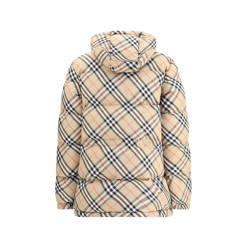 Beige Polyester Full-Length JacketBurberry’s hooded Check Down Jacket combines tradition and functionality in a bold design. Crafted in the iconic Burberry Check pattern, it features a regular fit with an adjustable hood and drawstring waist. Completing t