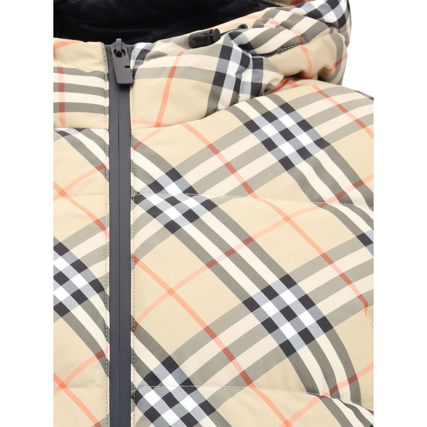 Beige Polyester Full-Length JacketBurberry’s hooded Check Down Jacket combines tradition and functionality in a bold design. Crafted in the iconic Burberry Check pattern, it features a regular fit with an adjustable hood and drawstring waist. Completing t