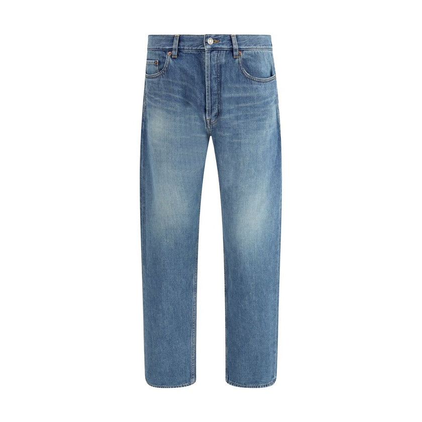Blue Cotton Straight-Leg JeansSaint Laurent’s Mick Jeans are a timeless classic cut, crafted with a long straight-leg silhouette and a mid-rise waist. The five-pocket design is complemented by a zippered flap and button closure, while belt loops at the wa