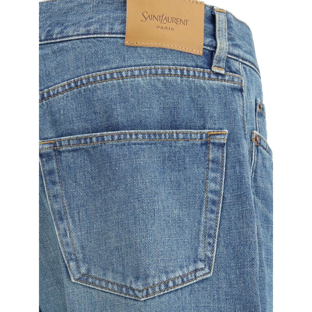 Blue Cotton Straight-Leg JeansSaint Laurent’s Mick Jeans are a timeless classic cut, crafted with a long straight-leg silhouette and a mid-rise waist. The five-pocket design is complemented by a zippered flap and button closure, while belt loops at the wa