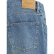 Blue Cotton Straight-Leg JeansSaint Laurent’s Mick Jeans are a timeless classic cut, crafted with a long straight-leg silhouette and a mid-rise waist. The five-pocket design is complemented by a zippered flap and button closure, while belt loops at the wa