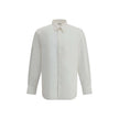 White Cotton Dress ShirtSaint Laurent’s cotton Shirt is a clean and elegant design. Made of cotton poplin, it features a classic collar, a front closure with concealed buttons for a minimal and neat effect, and a discreet but distinctive embroidered logo
