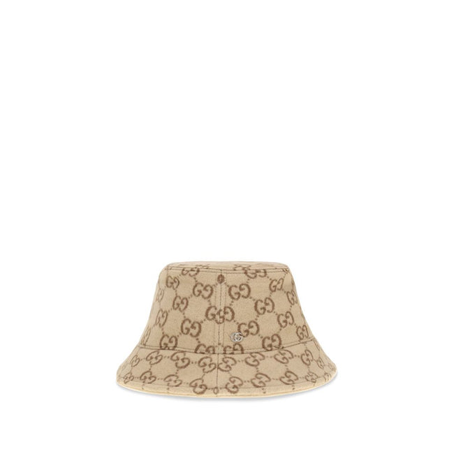 GG jacquard wool Bucket HatGucci’s GG jacquard wool Bucket Hat is a distinctive accessory that combines tradition and contemporary style. Crafted from soft wool, it features an elegant GG jacquard monogram motif, enhanced by a double-fabric lining for com