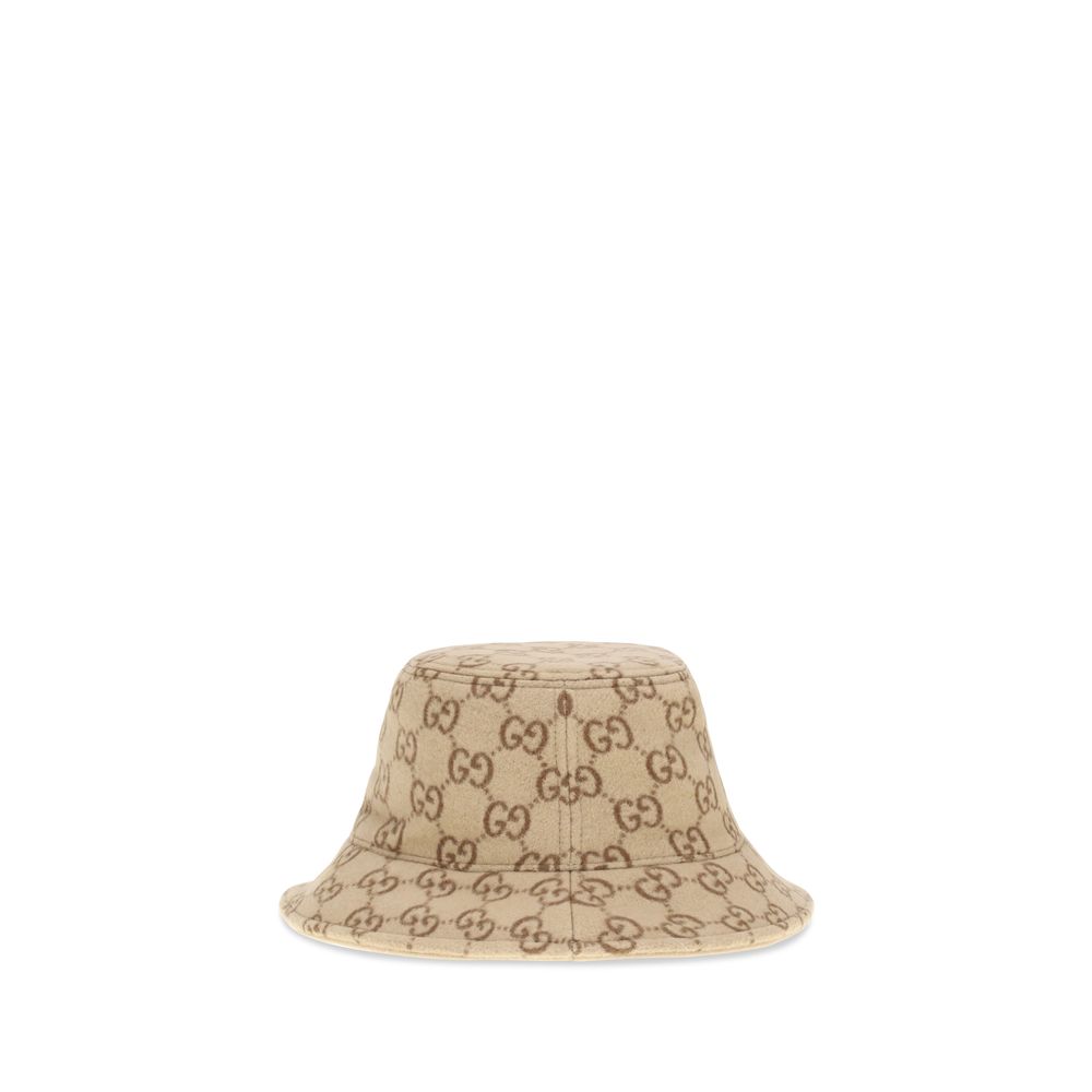 GG jacquard wool Bucket HatGucci’s GG jacquard wool Bucket Hat is a distinctive accessory that combines tradition and contemporary style. Crafted from soft wool, it features an elegant GG jacquard monogram motif, enhanced by a double-fabric lining for com