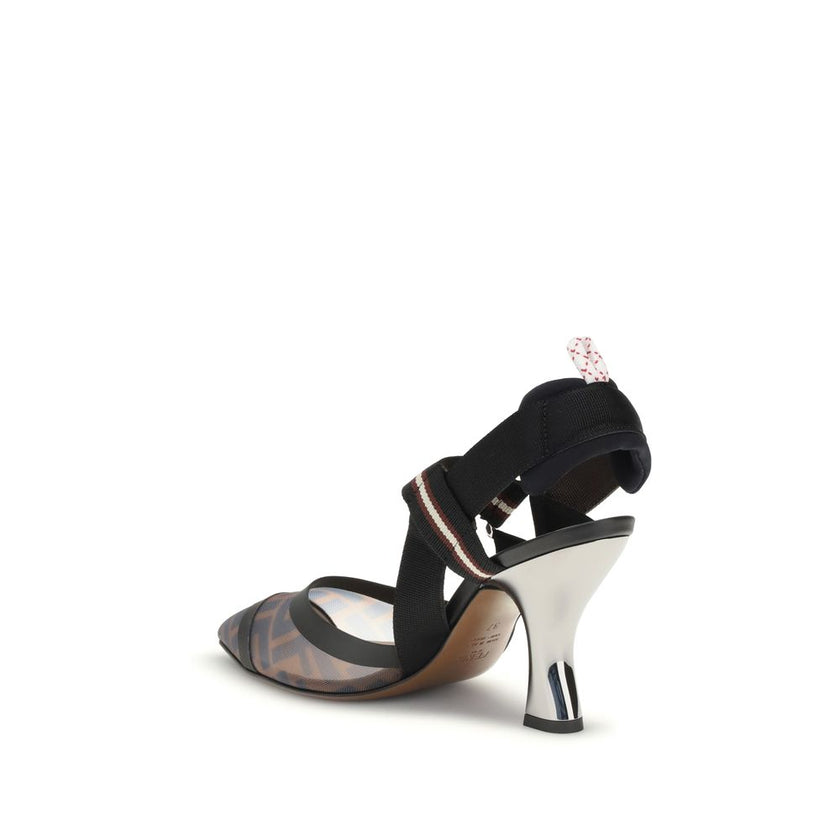 Black Calf Leather Bos Taurus Mid Heel PumpsFendi’s Colibrì mesh Pumps combine modernity and femininity in a sophisticated silhouette. The transparent mesh toe with almond design lends lightness and a contemporary touch, while the elastic sling-back strap