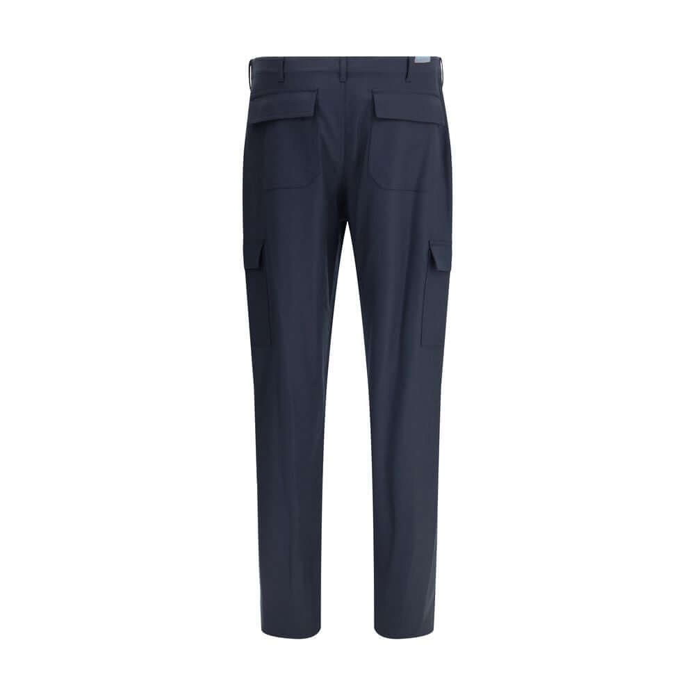 Blue Wool Cargo PantsEtro’s Flannel cargo Pants reinterpret a utility icon with the Maison’s signature elegance. Made of soft flannel, they feature a zipper and hook-and-eye closure, belt loops at the waist and a functional design enriched by two large si