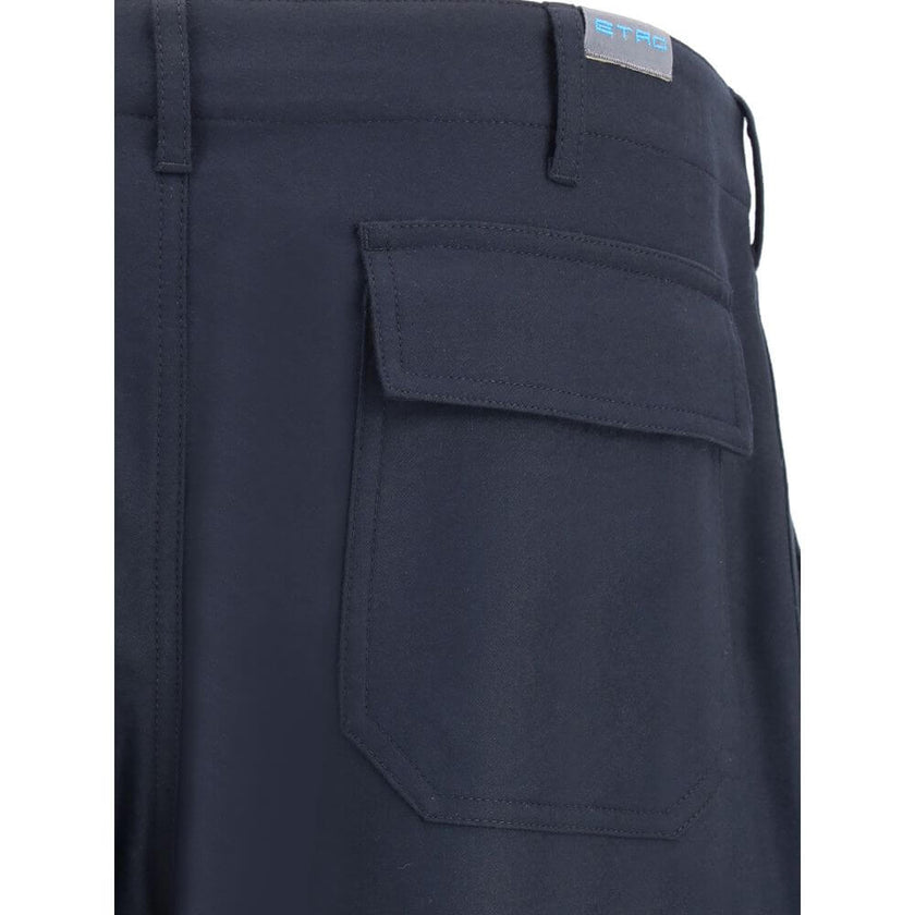 Blue Wool Cargo PantsEtro’s Flannel cargo Pants reinterpret a utility icon with the Maison’s signature elegance. Made of soft flannel, they feature a zipper and hook-and-eye closure, belt loops at the waist and a functional design enriched by two large si