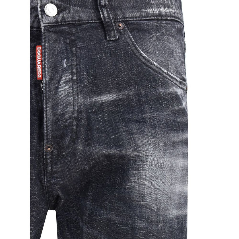 Black Cotton Slim Fit JeansDsquared2’s Cool Guy Jeans combine a slim fit and iconic details in a sharply tailored design. Featuring waist loops and a zip-and-button closure, they feature a classic five-pocket construction and are embellished with a logo l