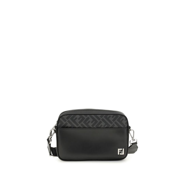 Black Leather Shoulder BagFendi’s FF leather and canvas Shoulder Bag is a compact model that combines elegance and functionality. Made of smooth black leather and FF Canvas in the same color, it is embellished with a metal FF logo applique. It features an