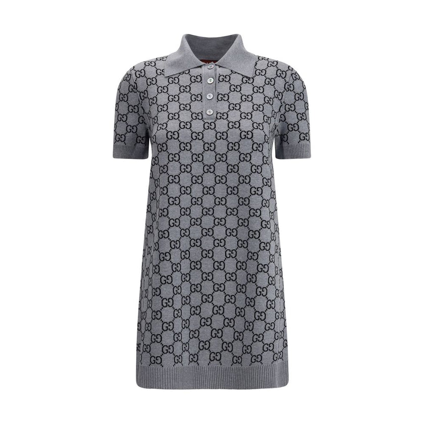 Gray Wool Casual DressGucci’s GG Supreme Polo Dress reinterprets the house’s iconic print in a short, sporty silhouette. Made with the classic GG Supreme pattern, it is complemented by a ribbed collar and hems that emphasize its tennis-inspired style. The