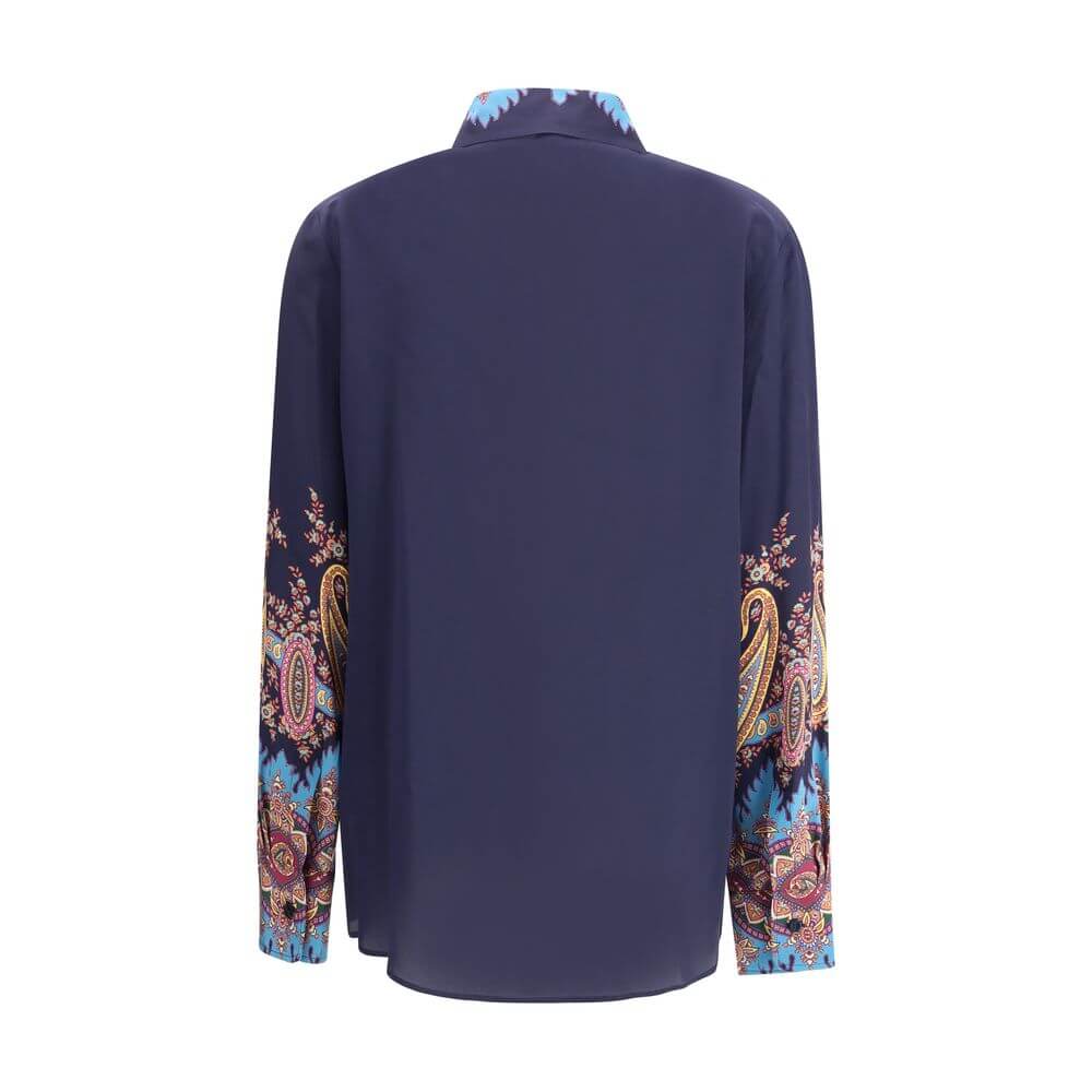 Multicolor Silk Pattern ShirtEtro’s silk Shirt is made by lightweight pure silk crepe de Chine and embellished with a refined placed floral Paisley print. Featuring a straight, loose fit boyfit silhouette, it features a classic collar, front button closur