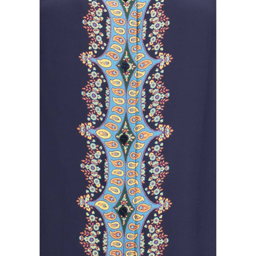 Multicolor Silk Pattern ShirtEtro’s silk Shirt is made by lightweight pure silk crepe de Chine and embellished with a refined placed floral Paisley print. Featuring a straight, loose fit boyfit silhouette, it features a classic collar, front button closur